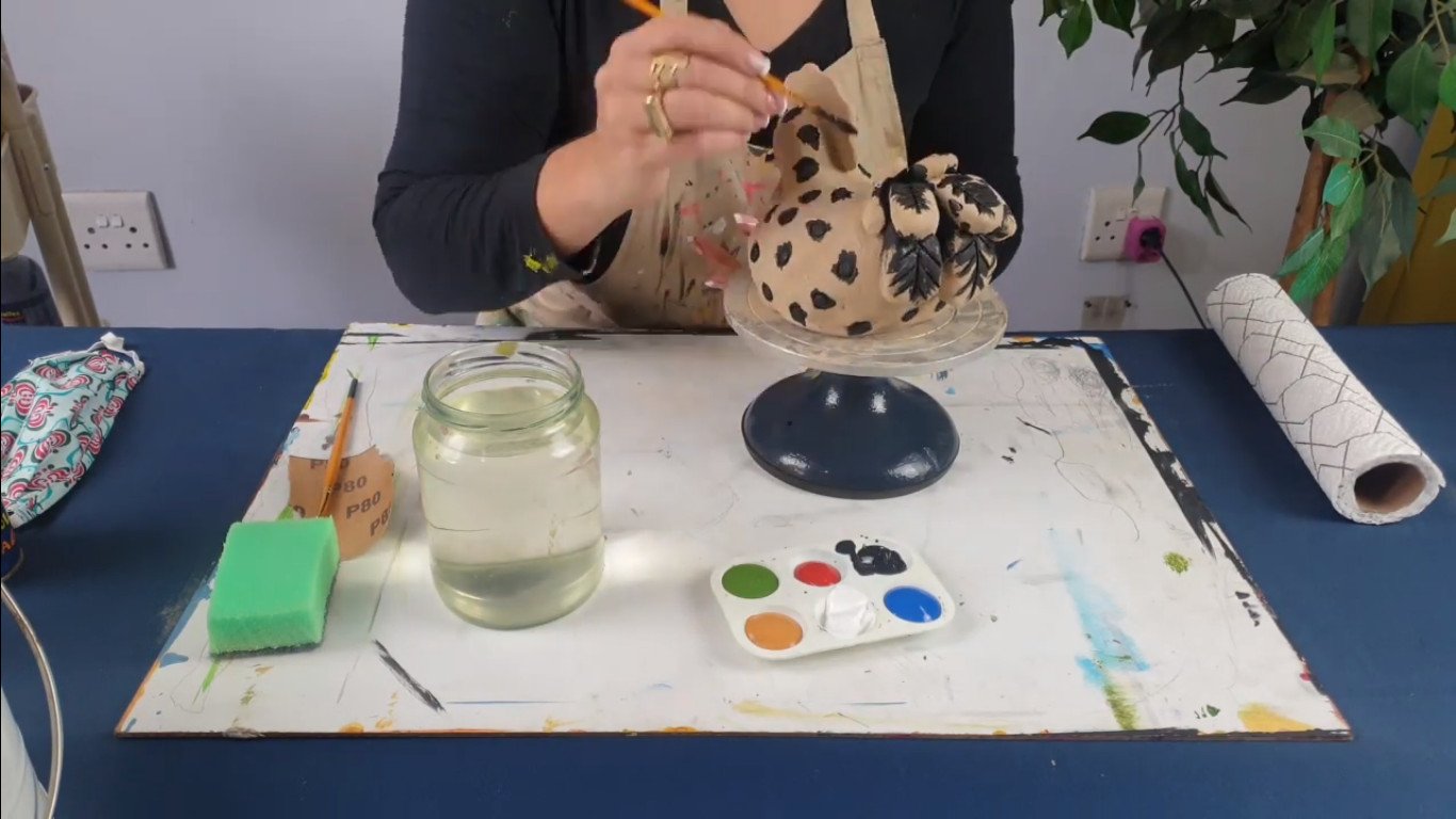 acrylic paint, air-dry clay sculpture