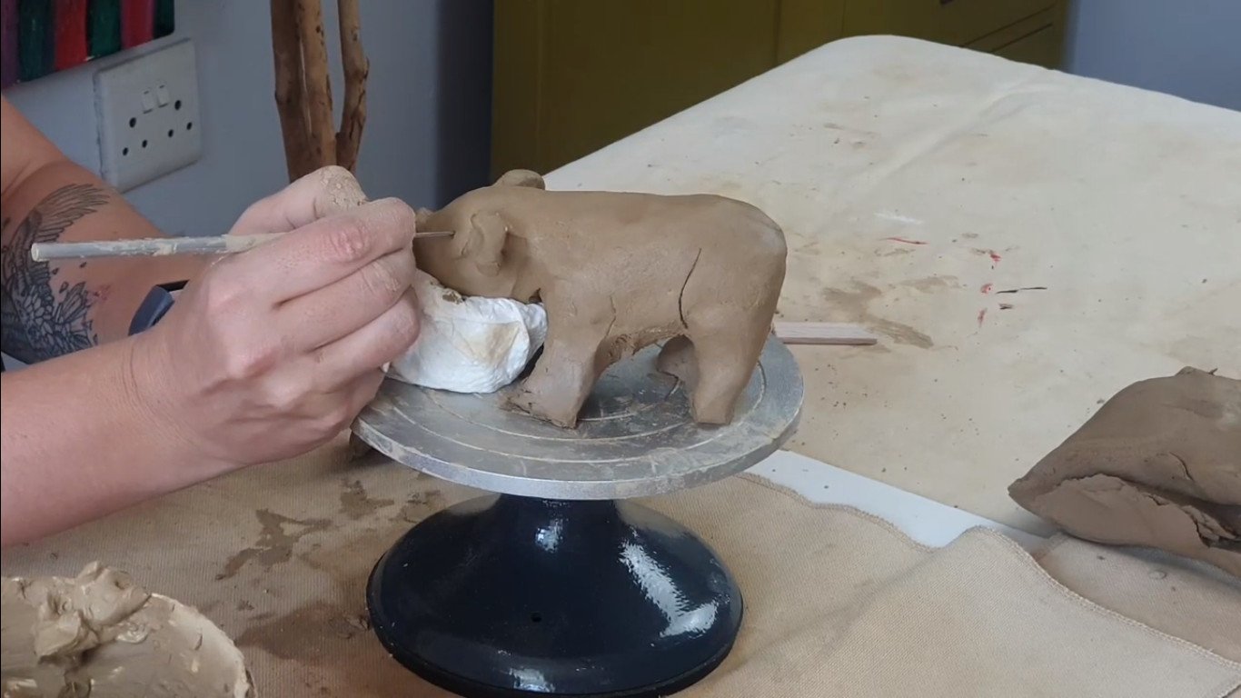 Adding the pig's ears