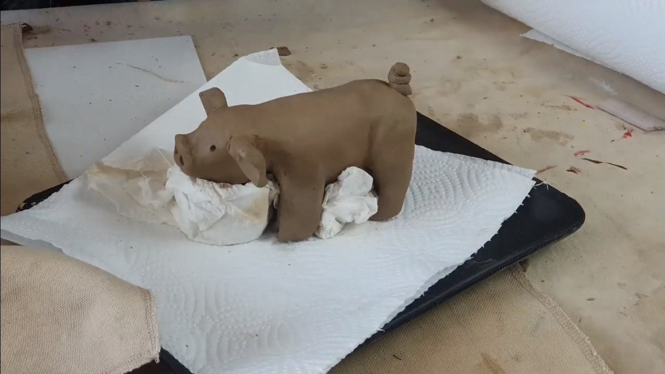 air-dry clay sculpture of a pig